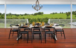 A outdoor dining area with views of countryside