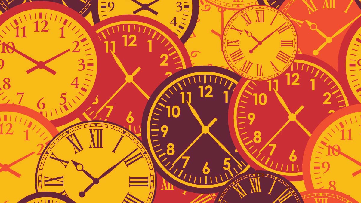 An image of clocks in reds, oranges and maroons